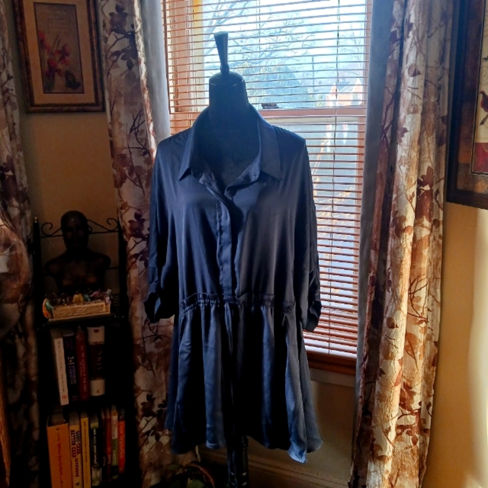 Dress by Arna York Collection.